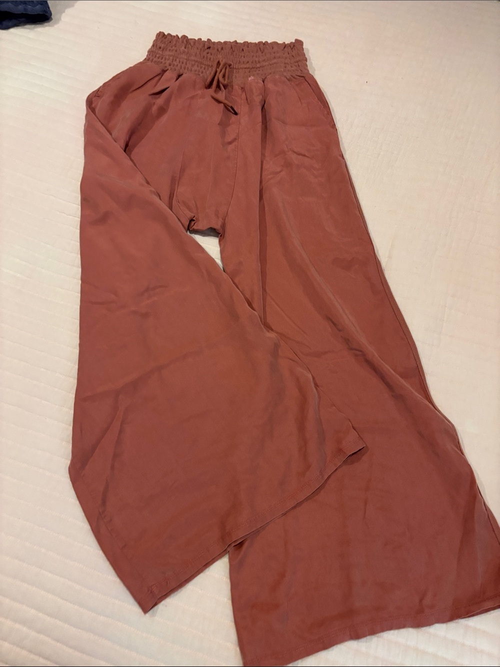 FP Movement by Free People Wide Leg Smocked Waist Pants in dusty Pink/Terracotta